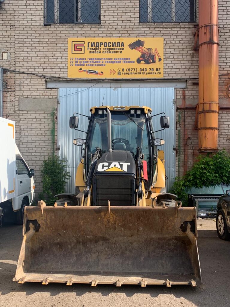 Ремонт гидроцилиндра экскаватора-погрузчика CAT Caterpillar